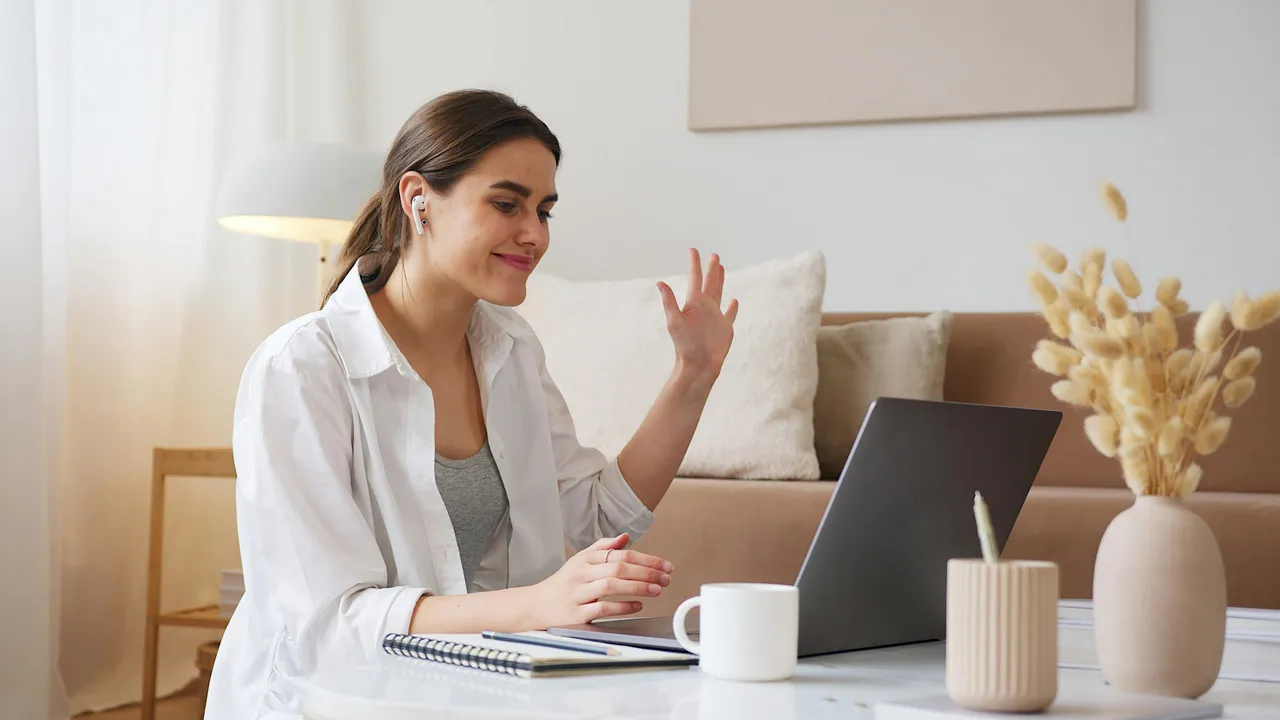 Woman video call laptop